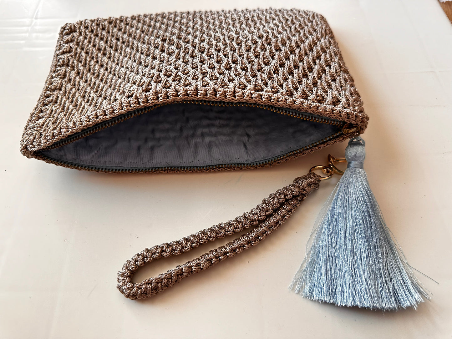 Gray Hand-Crocheted Luxury Clutch Bag with Blue Tassel Detail